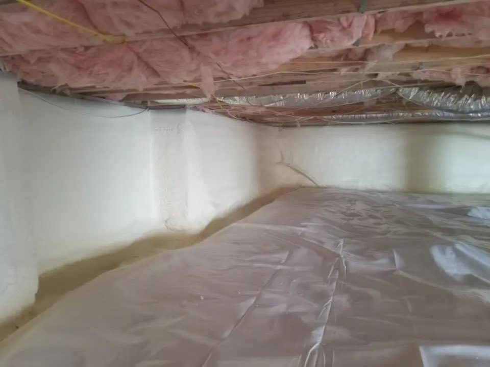 Crawl space encapsulation with closed-cell spray foam for Storm Damage Roof Repair in Smithfield